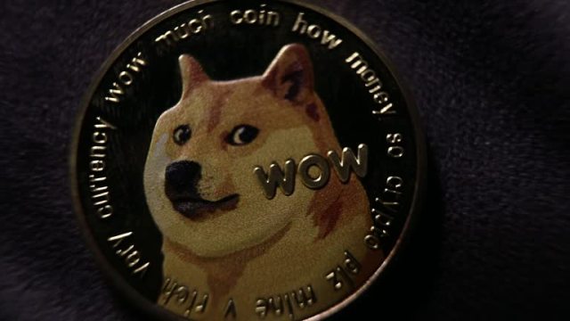Il prezzo del Dogecoin risale a 14 dollari: ecco perché un rally si mantiene su questo livello di supporto.